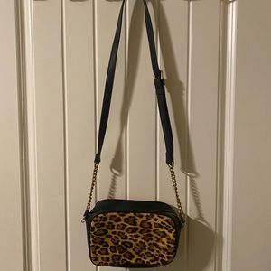 Cheetah print faux calf hair cross body bag with adjustable chain strap, EUC